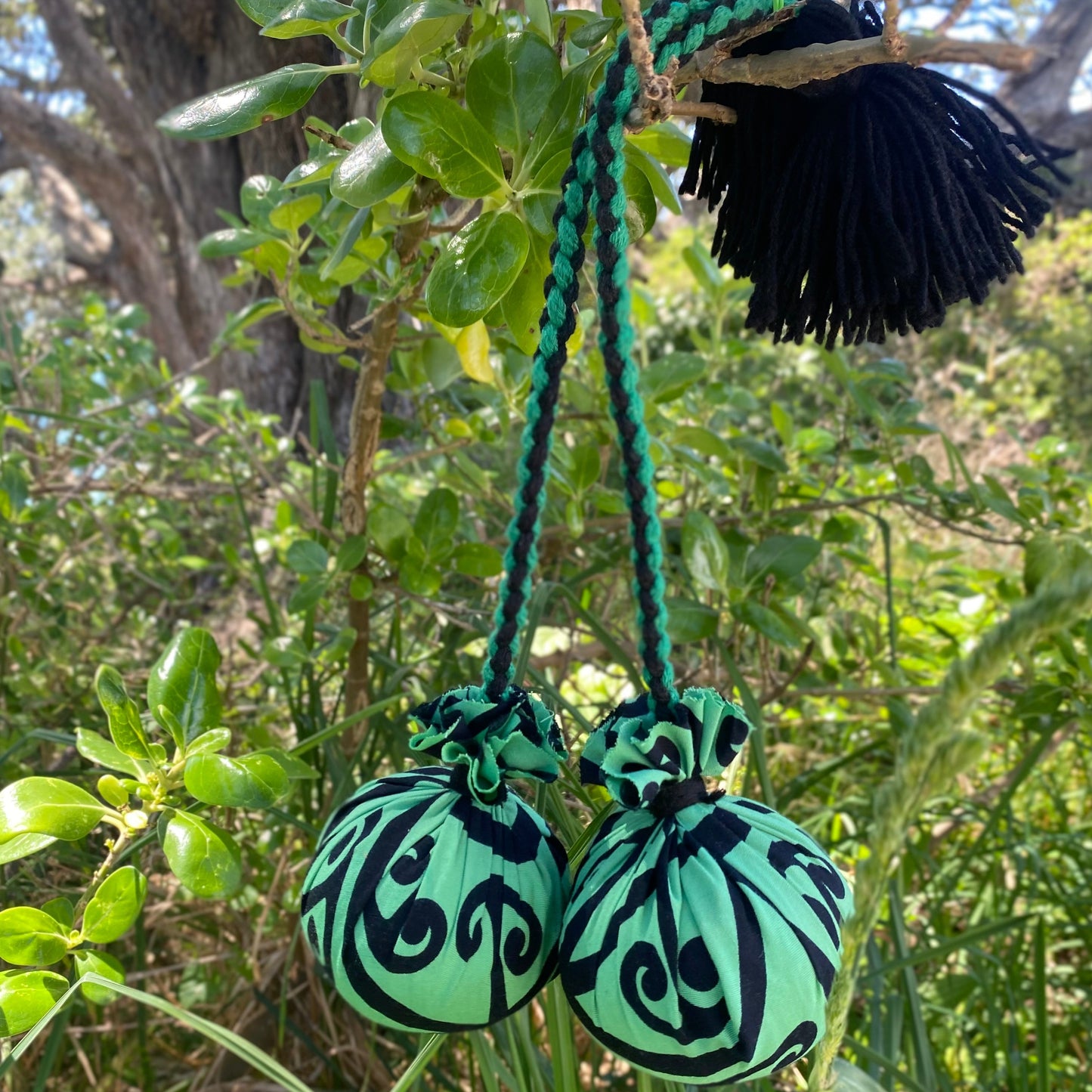 NZ Māori Poi Green Koru Rakau with Black & Green Braided Cord