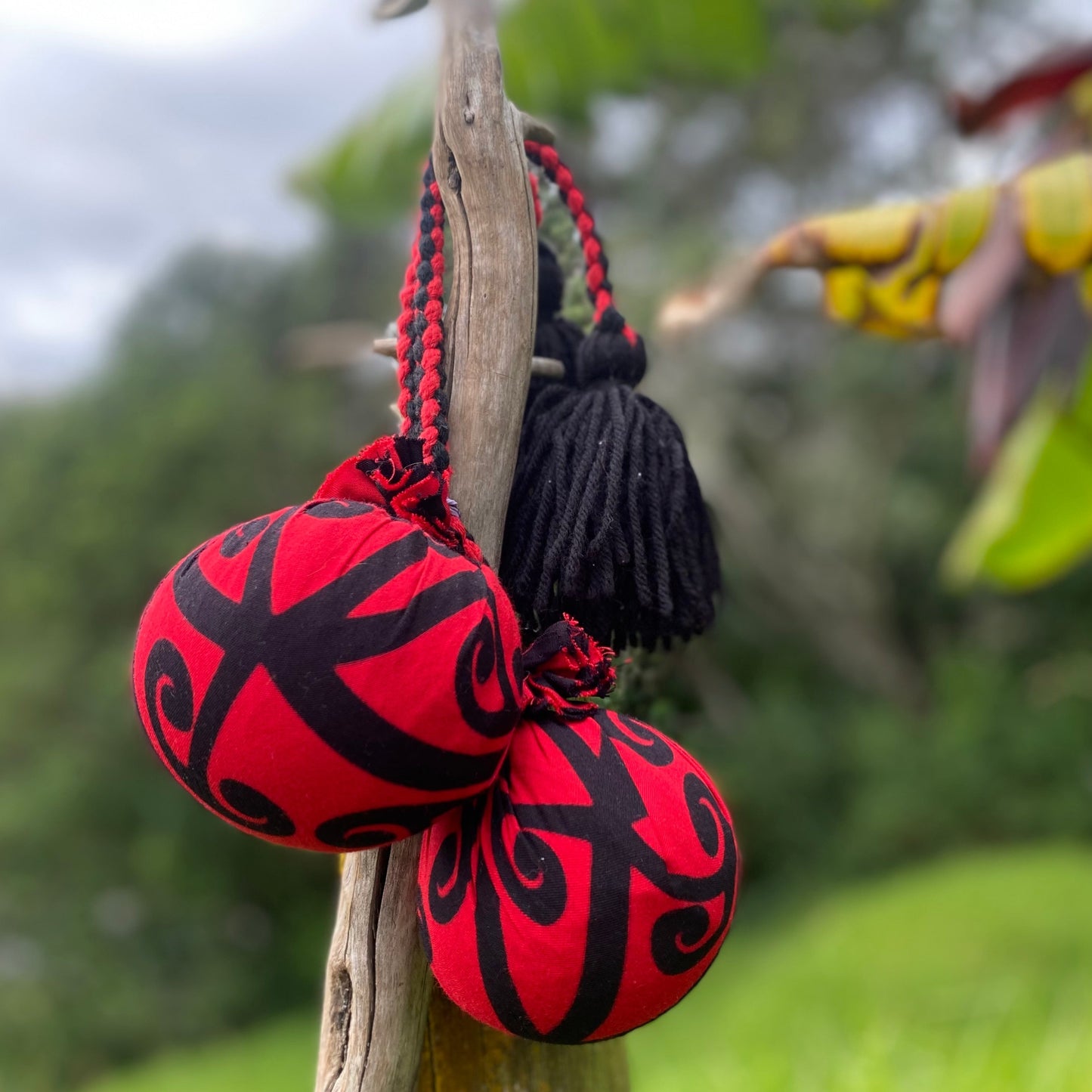 NZ Māori Poi Red Koru Rakau with Red & Black Braided Cord