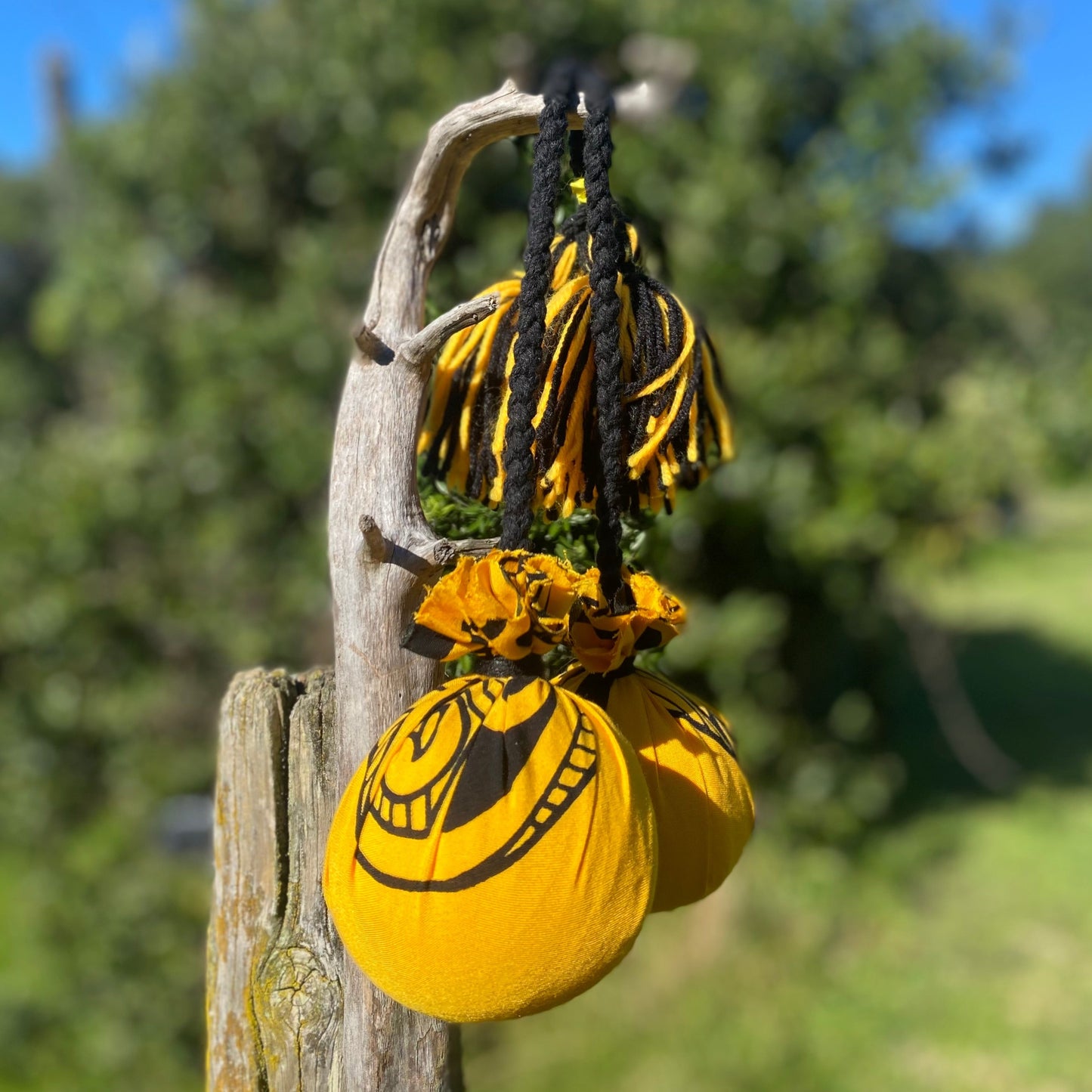 NZ Māori Poi Yellow Manawa Koru with Black Braided Cord