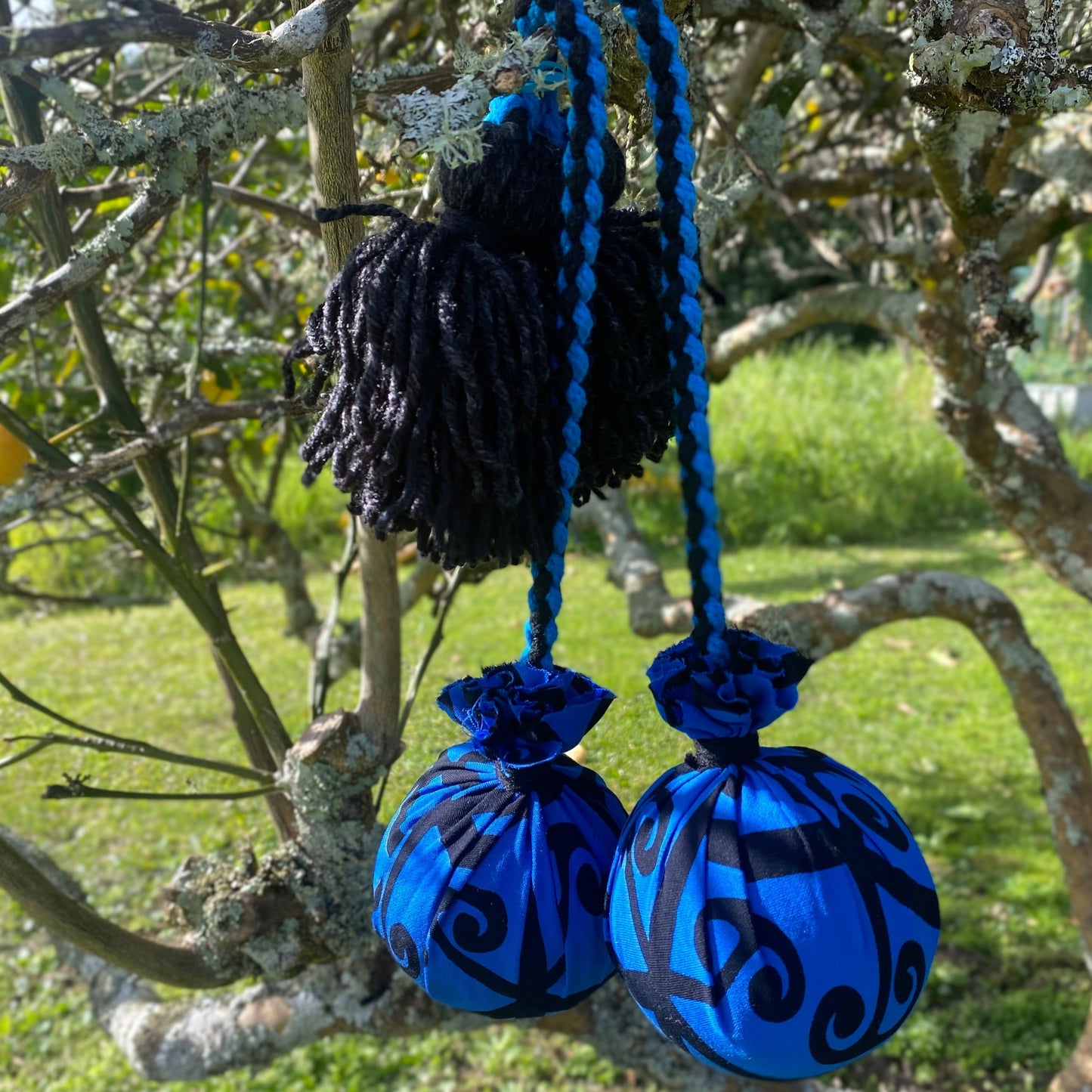 Māori Poi Blue Koru Rakau with Blue & Black Braided Cord