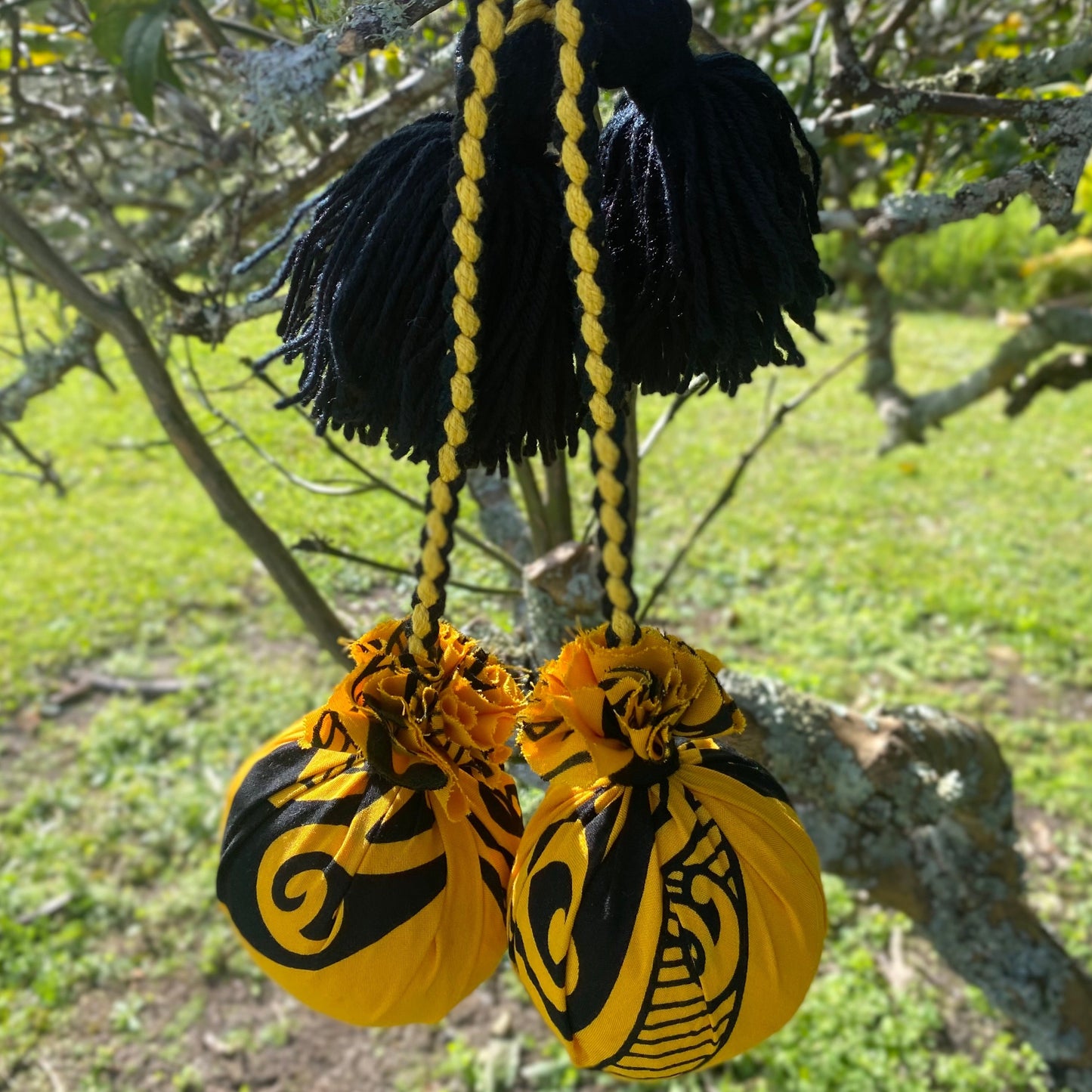 NZ Māori Poi Yellow Manawa Koru with Black& Yellow Braided Cord