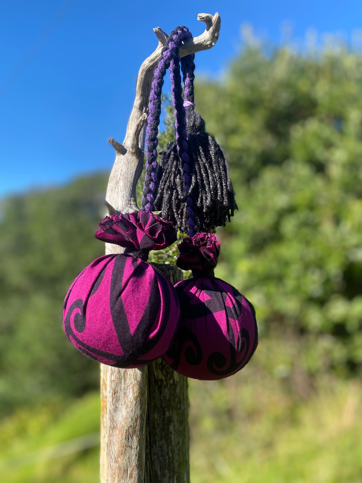 Māori Poi Purple Koru Rakau with purple & black Braided Cord